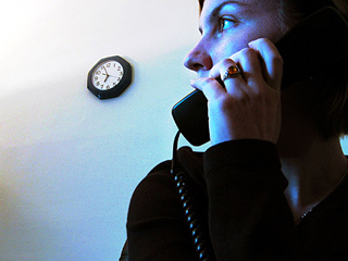 Young woman on telephone.