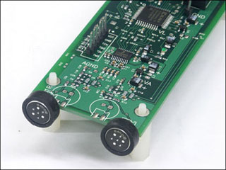 A mixed-signal printed circuit board containing both analog and digital components.